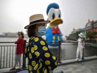 Le parc d'attractions Disneyland de Shanghai rouvre ses portes au public le 11 mai 2020 - Hector RETAMAL [AFP]