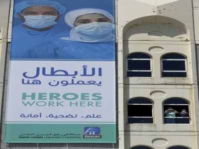 Des infirmières célèbrent la journée internationale des infirmières à l'hôpital Rafik Hariri de Beyrouth, le 12 mai 2020 - JOSEPH EID [AFP]