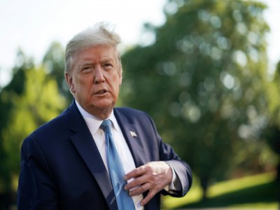 Le président américain Donald Trump répond aux questions des journalistes dans les jardins de la Maison Blanche le 15 mai 2020 - MANDEL NGAN [AFP/Archives]