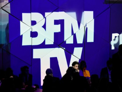 NextRadioTV, maison-mère de BFMTV et RMC, qui anticipe un écroulement des recettes publicitaires, va couper dans ses effectifs - BERTRAND GUAY [AFP/Archives]