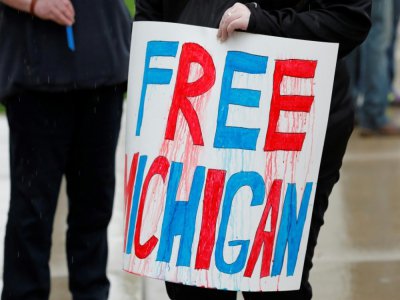 Des manifestants appellent à "Libérer" le Michigan le 1er mai 2020 à Lansing - JEFF KOWALSKY [AFP/Archives]