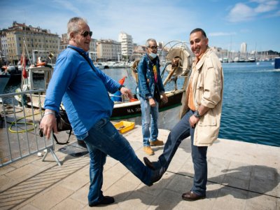 Salutations sur le Vieux port de Marseille, le 17 mai 2020 - CLEMENT MAHOUDEAU [AFP]