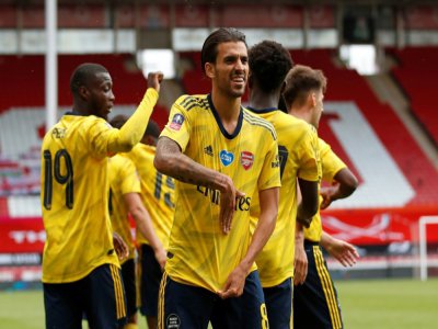 Le milieu espagnol d'Arsenal Dani Ceballos (c) vient de marquer le but de la victoire (2-1) sur le terrain de Sheffield, le 28 juin 2020 - ANDREW BOYERS [POOL/AFP]