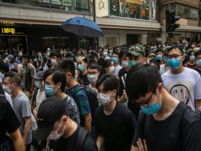 Rassemblement à Hong Kong contre la nouvelle loi sur la sécurité nationale, le 1er juillet 2020 - DALE DE LA REY [AFP]