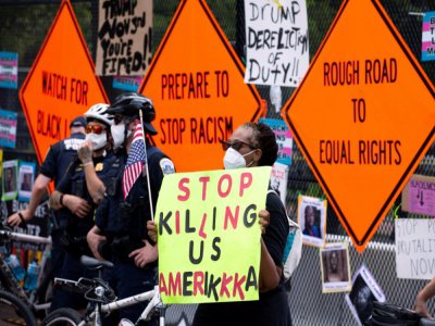 Une manifestante antiraciste à Washington le 4 juillet 2020 - Jose Luis Magana [AFP]