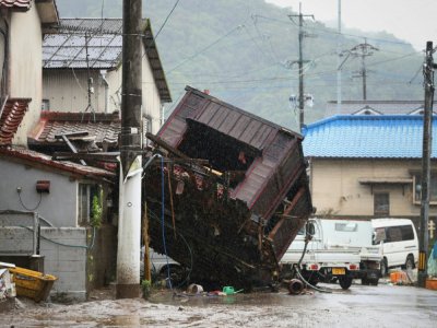The rain caused damage across much of the Kyushu island - STR [JIJI PRESS/AFP]