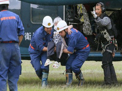 Rescue has only been possible by helicopter in many cases - STR [JIJI PRESS/AFP]