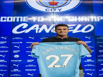 Joao Cancelo lors de sa signature à Manchester City le 8 août 2019 - OLI SCARFF [AFP/Archives]