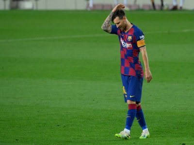 L'attaquant argentin Lionel Messi lors de la défaite contre Osasuna au Camp Nou le 16 juillet 2020 - LLUIS GENE [AFP]