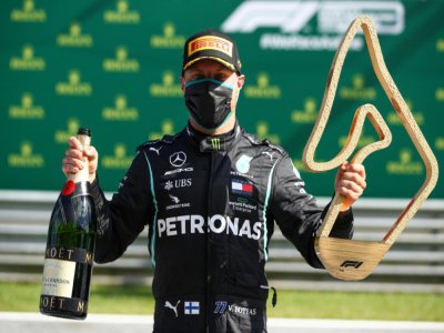Le pilote finlandais de Mercedes Valtteri Bottas premier vainqueur de la saison F1 2020, distingué au GP d'Autriche, le 5 juillet à Spielberg - Mark Thompson [POOL/AFP/Archives]