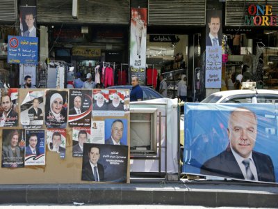 Des affiches de candidats aux élections législatives, à Damas (Syrie) le 15 juillet 2020 - LOUAI BESHARA [AFP/Archives]