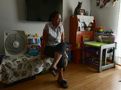 Avec la crise du Covid-19, Sonia Herrera, Hondurienne de 52 ans, a perdu son emploi de femme de ménage non déclarée à Madrid. Pour vivre, elle dépend aujourd'hui de la banque alimentaire. Le 25 juin 2020 - JAVIER SORIANO [AFP]
