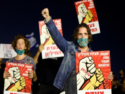 Manifestation contre le Premier ministre israélien Benjamin Netanyahu, accusé de corruption, le 25 juillet 2020 à Tel-Aviv - JACK GUEZ [AFP]