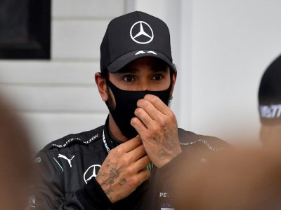 Le Britannique Lewis Hamilton après sa victoire lors du Grand Prix de Hongrie, le 20 juillet 2020 à Budapest - JOE KLAMAR [POOL/AFP/Archives]