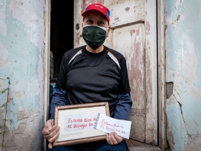 Jose Ojeda, le mineur qui a griffonné le premier message remonté par une sonde annonçant au monde l'impensable: "Nous allons bien, dans le refuge, les 33". Chez lui, à Copiapo, dans le nord du Chili, le 20 juillet 2020 - Alex F. CATRIN [AFP]