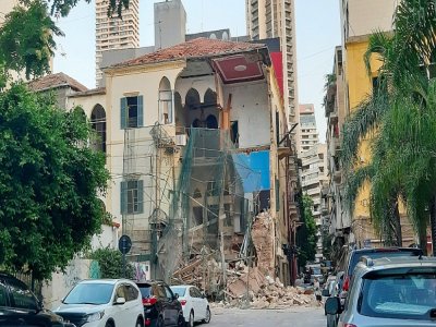 Une photo prise le 5 août 2020 montre un bâtiment détruit dans le quartier d'Achrafieh près du port de Beyrouth - Janine HAIDAR [AFP]