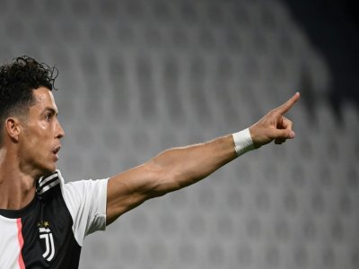 La star de la Juventus Cristiano Ronaldo après son but contre la Lazio Rome le 20 juillet 2020 à Turin - Marco BERTORELLO [AFP/Archives]