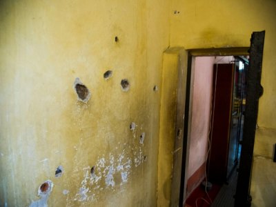 Des impacts de balles sur la façade de la maison où Léon Trotsky a été assassiné il y a 80 ans, le 10 août 2020 à Mexico - CLAUDIO CRUZ [AFP]
