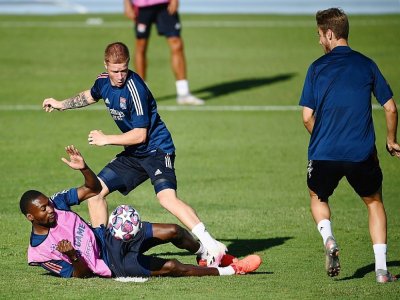 Les joueurs lyonnais préparent leur demi-finale contre le Bayern Munich lors d'une séance d'entraînement à Lisbonne, le 18 août 2020 - FRANCK FIFE [POOL/AFP]