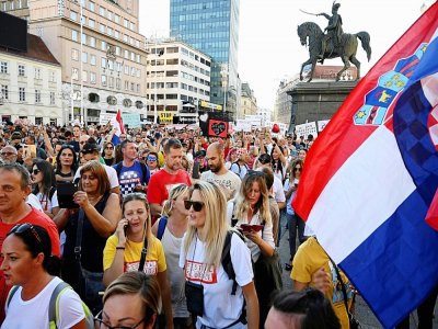 Plusieurs milliers de personnes manifestent à Zagreb contre le port du masque, le 5 septembre 2020 - DENIS LOVROVIC [AFP]