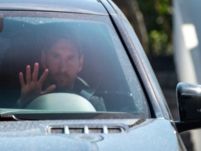 L'attaquant argentin de Barcelone part de son domicile pour la Cité sportive Joan Gamper, à Sant Joan Despi près de Barcelone, le 7 septembre 2020 - STRINGER [AFP]