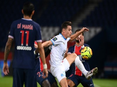 L'attaquant de Marseille, Florian Thauvin (c), buteur lors du match de Ligue 1 face au Paris-SG, au  Parc de Princes, le 13 septembre 2020 - FRANCK FIFE [AFP]