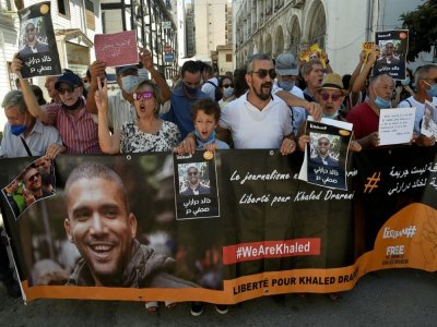 Manifestation pour demander la libération du journaliste Khaled Drareni le 14 septembre 2020 à Alger - RYAD KRAMDI [AFP]