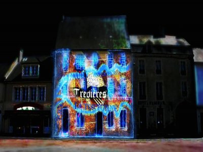Une mise en lumière de la future halle, un mapping vidéo sur les murs du cinéma et une animation musicale sont au programme pour retracer l'histoire de la commune de Trévières. - Département du Calvados