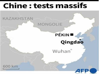 Chine : tests massifs dans une ville - John SAEKI [AFP]