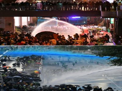 Comme leurs camarades à Hong Kong, les manifestants en Thaïlande ont dû affronter les canons à eau de la police - Mladen ANTONOV, NICOLAS ASFOURI [AFP/Archives]