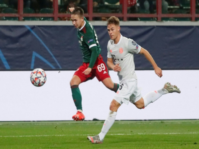 Le milieu du Bayern Munich, Joshua Kimmich (d), buteur lors du match de Ligue des champions sur le terrain du Lokomotiv Moscou, le 27 octobre 2020 - MAXIM SHIPENKOV [POOL/AFP]