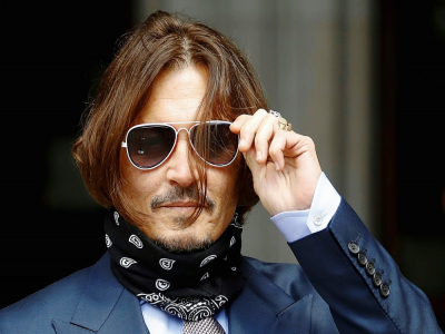 Johnny Depp arrive au tribunal de Londres le 17 juillet 2020 pour son procès en diffamation contre le tabloïd britannique The Sun - Tolga AKMEN [AFP/Archives]