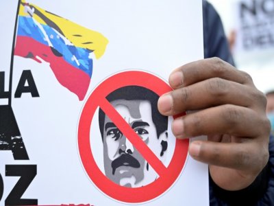 Des Vénézuéliens habitant en Colombie dénoncent depuis Bogota le scrutin législatif dans leur pays - Raul ARBOLEDA [AFP]