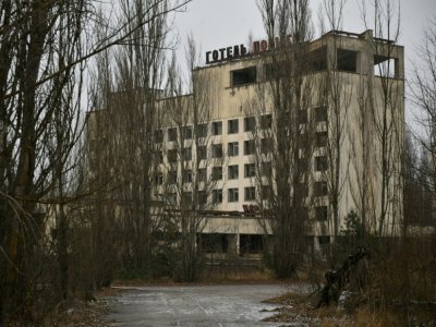 Un hôtel abandonné dans la ville fantôme de Pripiat, dans la zone d'exclusion de Tchernobyl, le 8 décembre 2020 - GENYA SAVILOV [AFP]