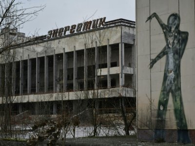 Des graffitis dans la ville fantôme de Pripiat, située dans la zone d'exclusion de Tchernobyl, le 8 décembre 2020 - GENYA SAVILOV [AFP]
