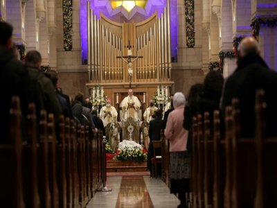 Messe de minuit à la Basilique de la Nativité, à Bethléem le 25 décembre 2020 - ABED AL HASHLAMOUN [POOL/AFP]
