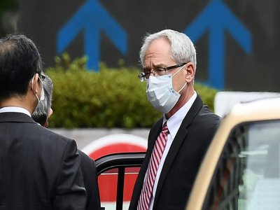L'ancien exécutif de Nissan, Greg Kelly (c) arrive au tribunal à Tokyo, le 15 septembre 2020 - CHARLY TRIBALLEAU [AFP]