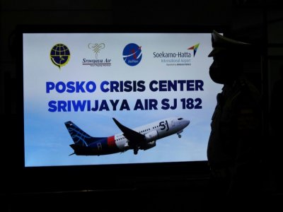 Un panneau de la cellule de crise mise en place après la disparition d'un Boeing de la compagnie indonésienne Sriwijaya, à l'aéroport Soekarno-Hatta à Tangerang près de Jakarta, le 9 janvier 2021 - FAJRIN RAHARJO [AFP]