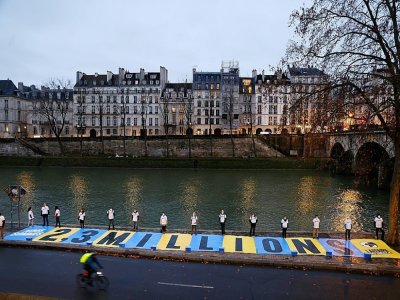 Action des ONG portant "L'affaire du Siècle", le 14 janvier 2021 à Paris - Thomas SAMSON [AFP]