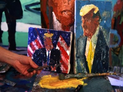 L'atelier du peintre israélien Iddo Markus regorge de portraits de Donald Trump, à Haïfa le 22 janvier 2021 - Emmanuel DUNAND [AFP]