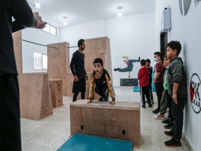 L'Académie de parkour Wallrunners, la première à Gaza, a été créée fin 2020 - MAHMUD HAMS [AFP]