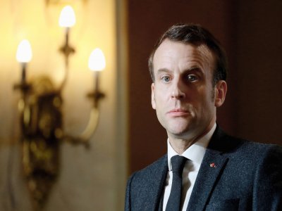 French President Emmanuel Macron looks on during a meeting hosted by the French Agency for Biodiversity (Office francais de la biodiversite - OFB) at the Majestic Congress Center in Chamonix, French Alps, on February 13, 2020, after he visited the 'M