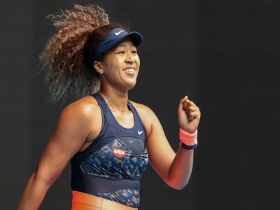 La joie de la Japonaise Naomi Osaka, victorieuse de l'Espagnole Garbine Mugurusa, en 8e de finale de l'Open d'Australie, le 14 février 2021 à Melbourne - David Gray [AFP]