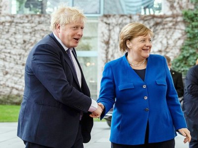 La chanelière allemande Angela Merkel et le Premier ministre britannique Boris Johnson, à Berlin le 19 janvier 2020 - John MACDOUGALL [AFP]