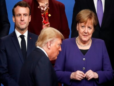 Donald Trump en présence du président français Emmanuel Macron et de la chancelière allemande Angela Merkel, lors du sommet de l'Otan de Londres, en décembre 2019 - CHRISTIAN HARTMANN [POOL/AFP/Archives]
