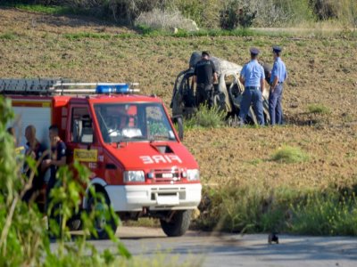 Les secours sur les lieux de l'attentat à la voiture piégée qui a causé la mort de la journaliste Daphne Caruana Galizia, le 16 octobre 2017 à Bidnija, à Malte - STR [AFP/Archives]