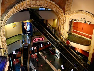 Le cinéma AMC Empire 25 de Times Square à New York, où les cinémas ont rouvert, le 5 mars 2021 - Angela Weiss [AFP]