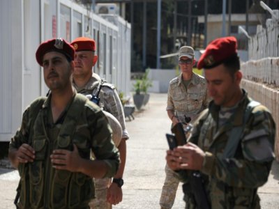 Soldats syriens et russes dans la base navale russe dans le port de Tartous, le 26 septembre 2019 - Maxime POPOV [AFP]
