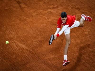 Le Serbe Novak Djokovic, lors de la finale du tournoi de Roland-Garros contre l'Espagnol Rafael Nadal, le 11 octobre 2020 à Paris - Thomas SAMSON [AFP]