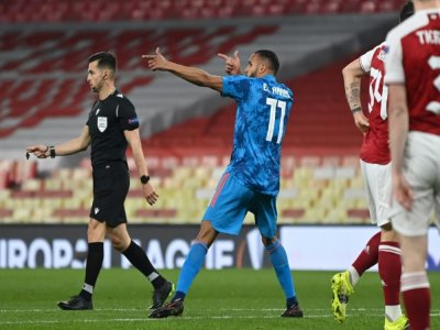 La célébration de l'attaquant marocain de l'Olympiakos, Youssef El-Arabi, après avoir ouvert le score contre Arsenal, lors de leur match retour de Ligue Europa, le 18 mars 2021 au Emirates Stadium à Londres - DANIEL LEAL-OLIVAS [AFP]